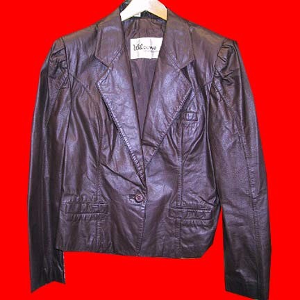 Wilson's Suede & Leather Woman's Brown leather single button jacket with curved line from underarm chest