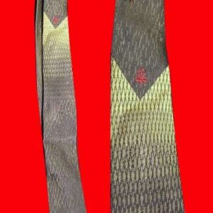 Springer of Alexandria 1950's Black with Gold Sharkskin like hatch pattern with Obvious pattern center skinny Tie
