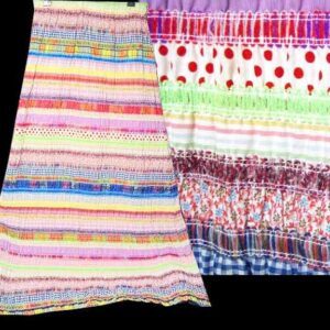 Various Cloth Remnant Strips with Stitched Colored Ribbons inbetween Full Length Skirt