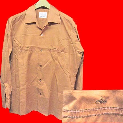 Arrow California designs shiny Pumpkin with two scroll design emblem pockets with horizontal stitch accents long sleeve shirt