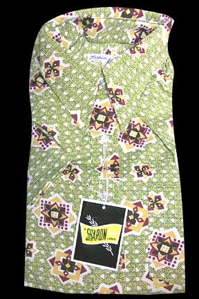 Fashion Knits White with Stalk Green Lattice with Block and Star Overlay Geos in Raspberry and Gold Short Sleeve with Package