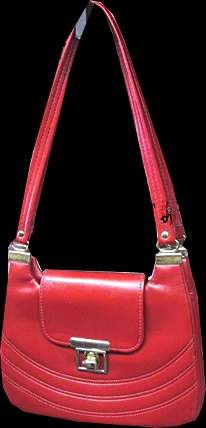 Red Vinyl with 3 Rounded Rib Front and large Fold Over Flap with Brass Closure and Brass Attached Shoulder Straps Purse